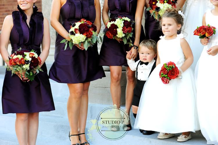 I loved the bridesmaids deep purple dresses They just pop with those 